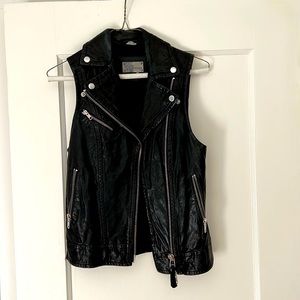 Pure leather motorcycle vest.